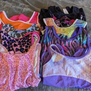 Lot of 9 girls unitards. Nice leos.